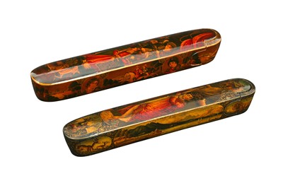 Lot 231 - TWO LACQUERED PAPIER-MÂCHÉ PEN CASES (QALAMDAN) WITH STANDING PORTRAITS