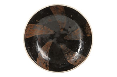 Lot 563 - A CHINESE BLACK-GLAZED RUSSET-SPLASHED TEA BOWL.