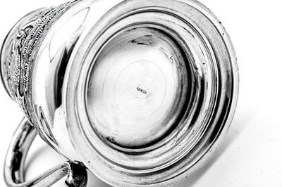 Lot 153 - A pair of mid-20th century Anglo-Indian silver pint mugs, Bombay circa 1940