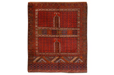 Lot 405 - A TURKOMAN RUG