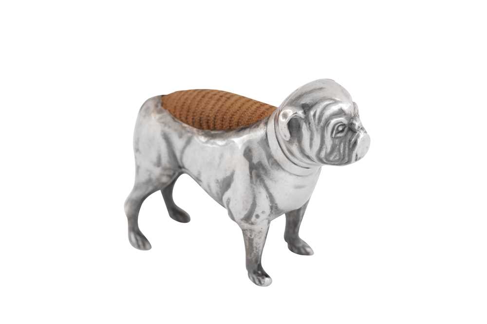 Lot 96 - An Edwardian sterling silver novelty pin cushion, Birmingham 1901 by Adie & Lovekin Ltd
