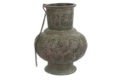 Lot 142 - A QAJAR TINNED COPPER OPENWORK VASE