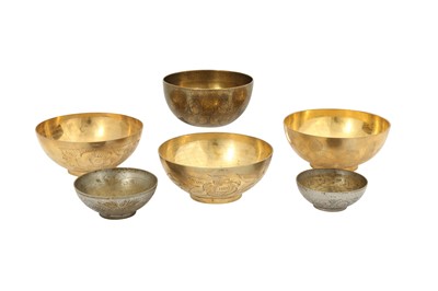 Lot 121 - FIVE ENGRAVED BRASS MAGIC BOWLS AND A QAJAR BOWL WITH FIGURAL DECORATION