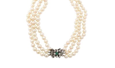 Lot 125 - A cultured pearl necklace with an emerald and diamond clasp