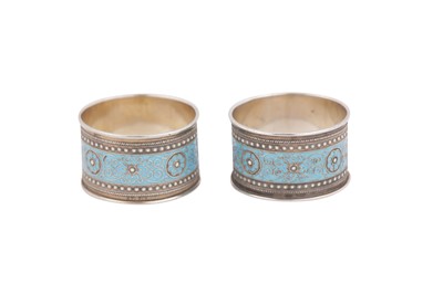 Lot 463 - A pair of early 20th century Norwegian silver and cloisonné enamel napkin rings, Oslo circa 1910 by Norsk Filigransfabrik