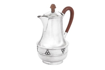 Lot 508 - A George V ‘Arts and Crafts’ sterling silver hot water pot, Birmingham 1935 by Albert Edward Jones