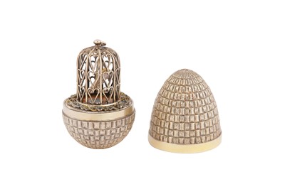 Lot 540 - An Elizabeth II sterling silver gilt surprise egg, London 1981 by Stuart Devlin (1931-2018)