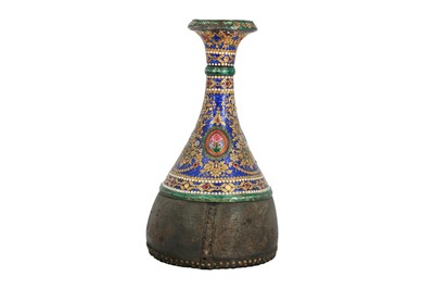 Lot 203 - A QAJAR GILT AND ENAMELLED SILVER AND LEATHER QALYAN BOTTLE