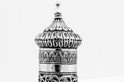 Lot 155 - An early to mid-20th century Anglo – Indian unmarked silver scroll holder, Bombay circa 1930-50