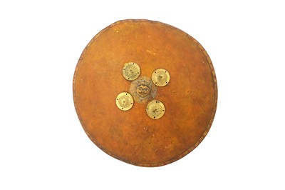 Lot 432 - A POLYCHROME-PAINTED, GILT AND LACQUERED RHINO HIDE SHIELD (DHAL)
