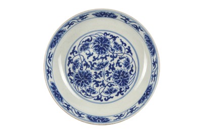 Lot 557 - A CHINESE BLUE AND WHITE 'LOTUS SCROLL' DISH.