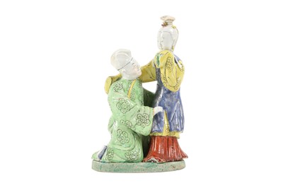 Lot 109 - A CHINESE ENAMELLED BISCUIT 'LOVERS' GROUP.