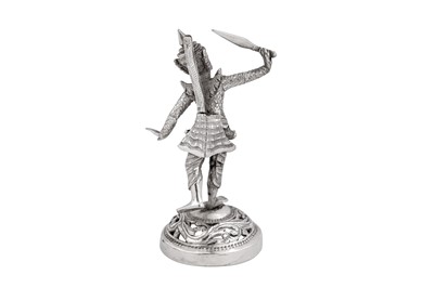 Lot 183 - A set of four mid-20th century Burmese unmarked silver menu holders, Rangoon circa 1950