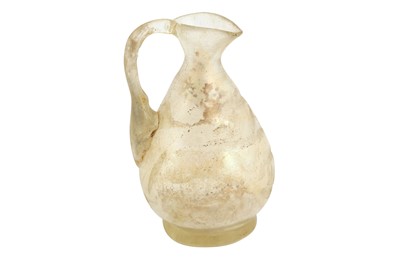 Lot 301 - A MINIATURE MOULD-BLOWN WHEEL-CUT TRANSPARENT GLASS EWER