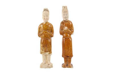 Lot 155 - TWO CHINESE GLAZED POTTERY FIGURES OF OFFICIALS.