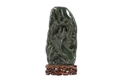 Lot 101 - A CHINESE SPINACH-GREEN JADE 'MOUNTAIN' BOULDER.