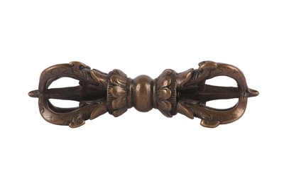 Lot 429 - A TIBETAN BRONZE VAJRA.