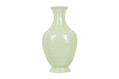 Lot 538 - A CHINESE CELADON-GLAZED 'BATS AND PEACHES' VASE.