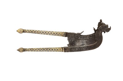 Lot 368 - A SINGHA-SHAPED GILT NIELLOWARE STEEL BETEL NUT CUTTER