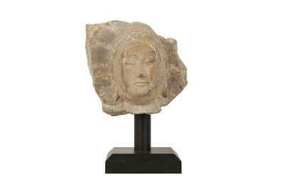 Lot 411 - A CHINESE STONE HEAD OF A BUDDHA.