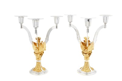 Lot 542 - A pair of Elizabeth II parcel gilt sterling silver three light candelabra, London 1981 by Hector Miller for Aurum