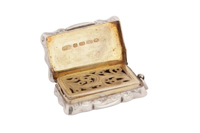 Lot 16 - A Victorian sterling silver and granite vinaigrette, Birmingham 1875 by Hilliard and Thompson