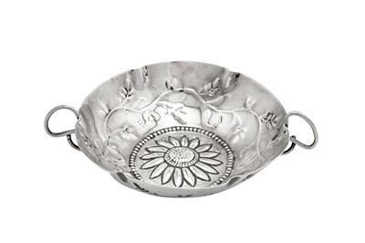 Lot 454 - An early 19th century Austrian 13 loth (812 standard) silver wine taster or dish, Vienna 1833 by Franz Berghofer (active 1827-45)