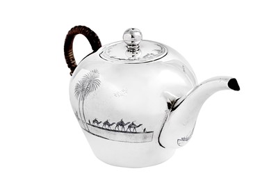Lot 370 - An early 20th century Iraqi silver and niello teapot, circa 1930 signed Omara, Amer, Raheem