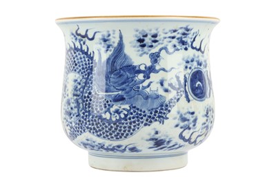 Lot 959 - A CHINESE BLUE AND WHITE 'DRAGON' CENSER.