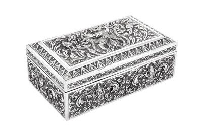 Lot 217 - A large early 20th century Siamese (Thai) silver cigarette box, probably Bangkok circa 1930
