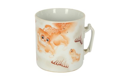 Lot 601 - A CHINESE TONGYISHUN 'BUDDHIST LION DOGS' TANKARD.