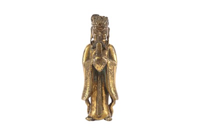Lot 173 - A CHINESE GILT-BRONZE FIGURE OF AN OFFICIAL.