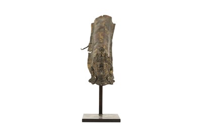 Lot 1102 - A CHINESE GILT-BRONZE FITTING.