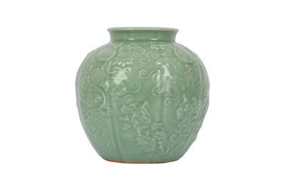 Lot 686 - A CHINESE CELADON-GLAZED 'MELON' VASE.