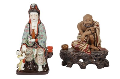 Lot 656 - A CHINESE PORCELAIN FIGURE OF GUANYIN