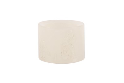 Lot 1049 - A CHINESE WHITE JADE ARCHER'S RING.