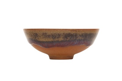 Lot 147 - A SMALL CHINESE FLAMBE-GLAZED CUP.
