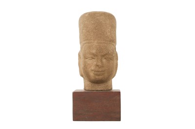 Lot 779 - A CARVED STONE HEAD, POSSIBLY VISHNU.