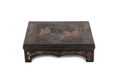 Lot 672 - A CHINESE POTTERY MODEL OF A KANG TABLE