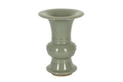 Lot 655 - A CHINESE CELADON-GLAZED VASE, GU.