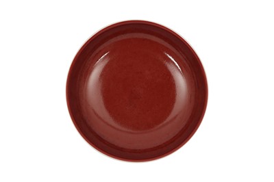 Lot 44 - A CHINESE COPPER RED-ENAMELLED DISH.