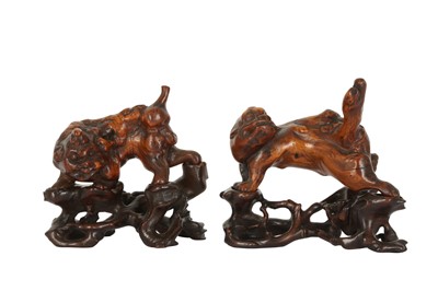 Lot 635 - A PAIR OF CHINESE BURLWOOD LIONS.