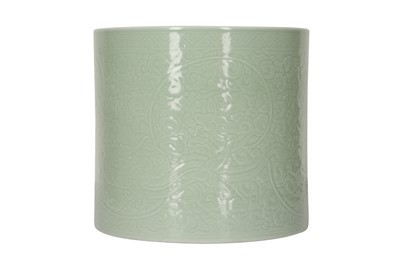 Lot 661 - A CHINESE CELADON 'CHILONG AND LINGZHI' BRUSH POT, BITONG.