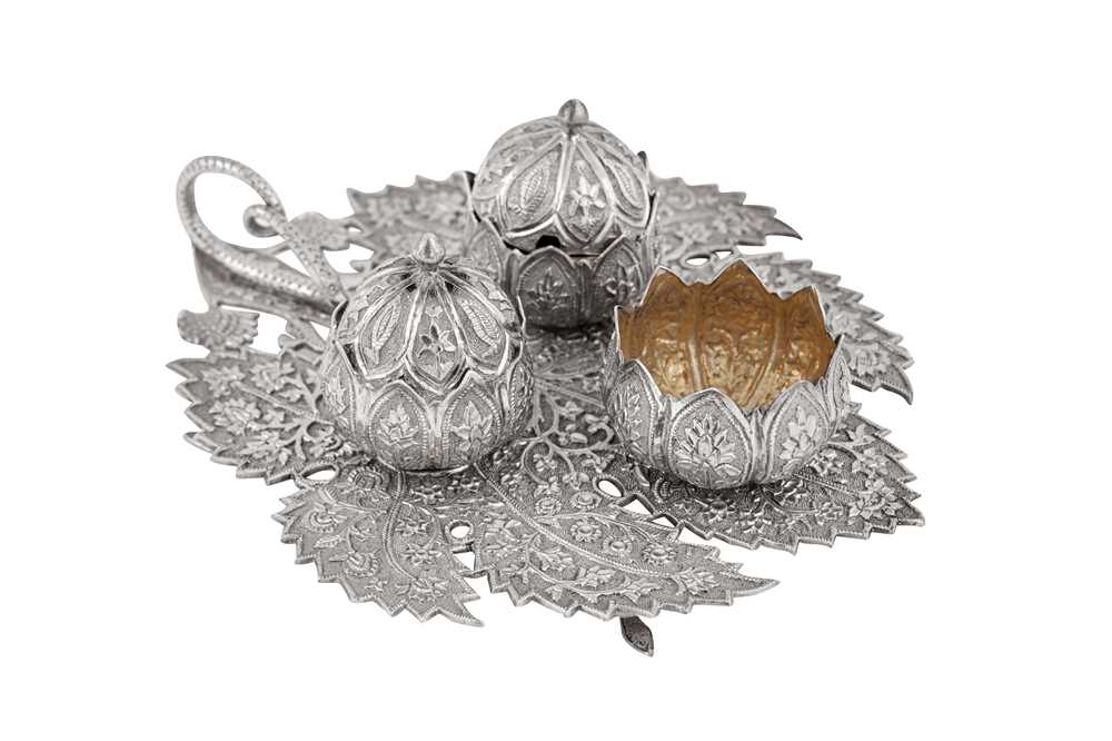 Lot 143 - A late 19th / early 20th century Anglo – Indian unmarked silver cruet, Kashmir circa 1900