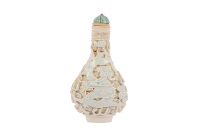 Lot 150 - A CHINESE BISCUIT 'DRAGON AND PHOENIX' SNUFF BOTTLE.