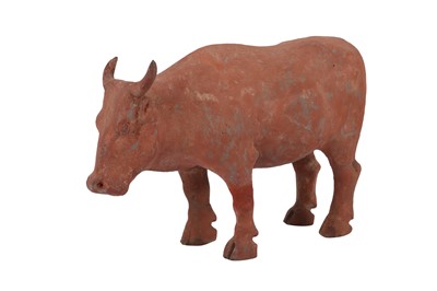 Lot 622 - A CHINESE POTTERY MODEL OF A BULL, HAN