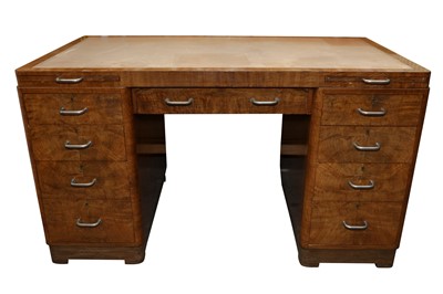 Lot 463 - AN ART DECO WALNUT TWIN PEDESTAL DESK