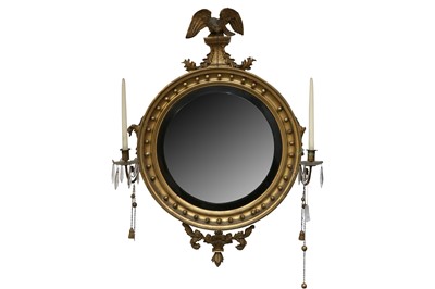 Lot 348 - A REGENCY GILT CONVEX WALL MIRROR