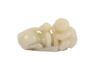 Lot 705 - A CHINESE PALE CELADON 'BOY AND DEER' GROUP.