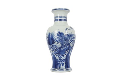 Lot 137 - A CHINESE BLUE AND WHITE 'QILIN ON ROCKS' BALUSTER VASE.